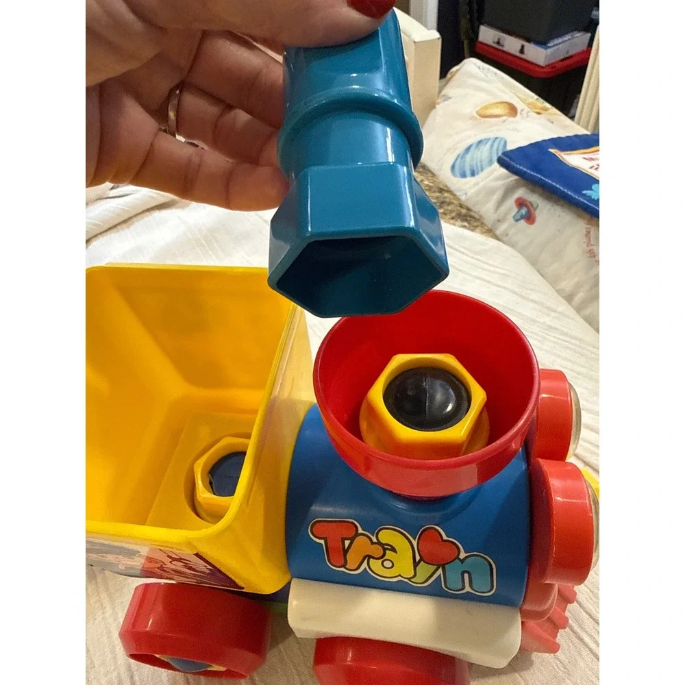 Vintage Take Apart Pull Along Toy Train with Wrench Tool Colors Conductor